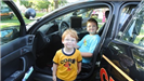 Kids Sitting in the Police Cruiser