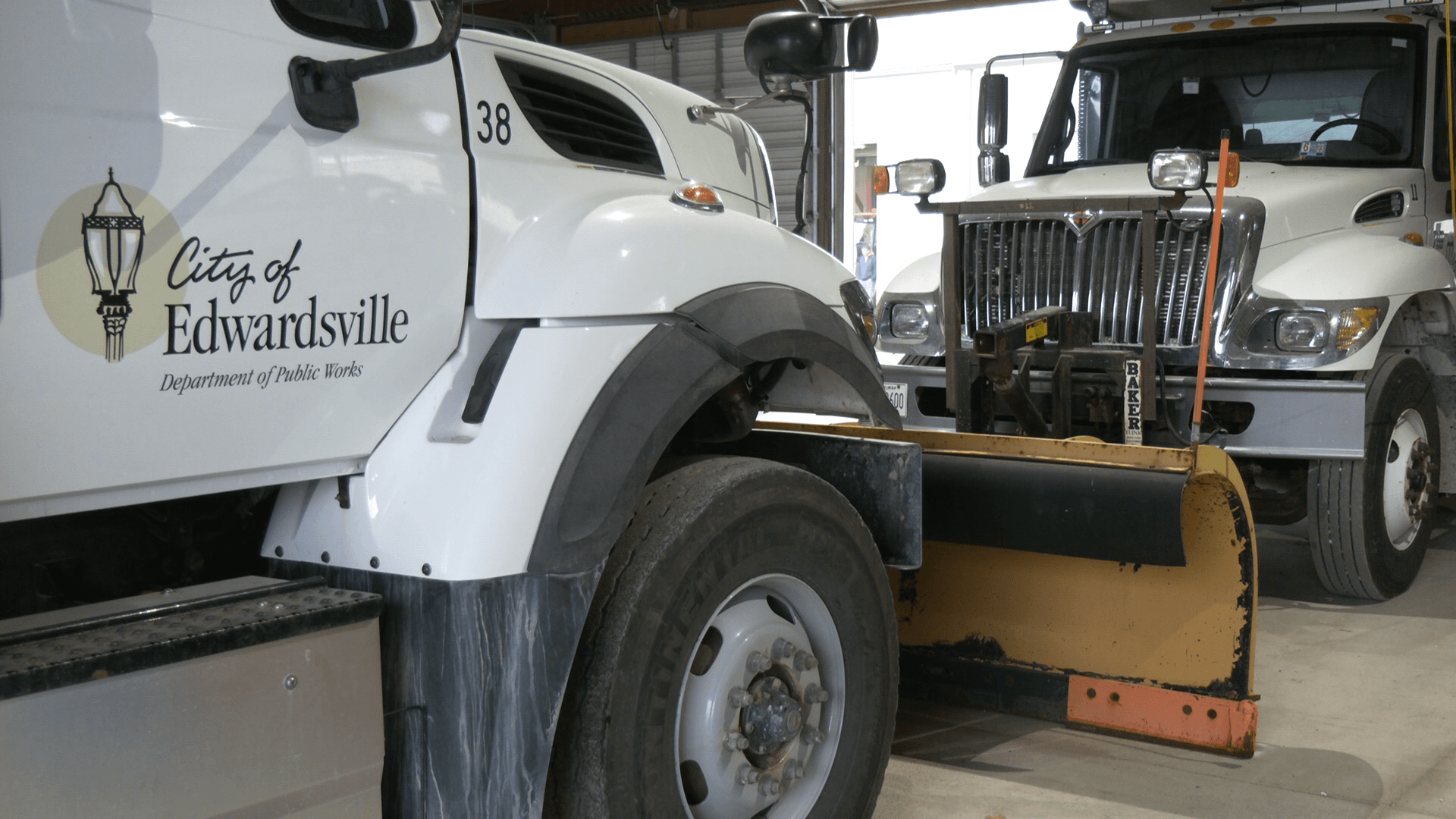 Side view of City of Edwardsville Public Works Truck with snow blade