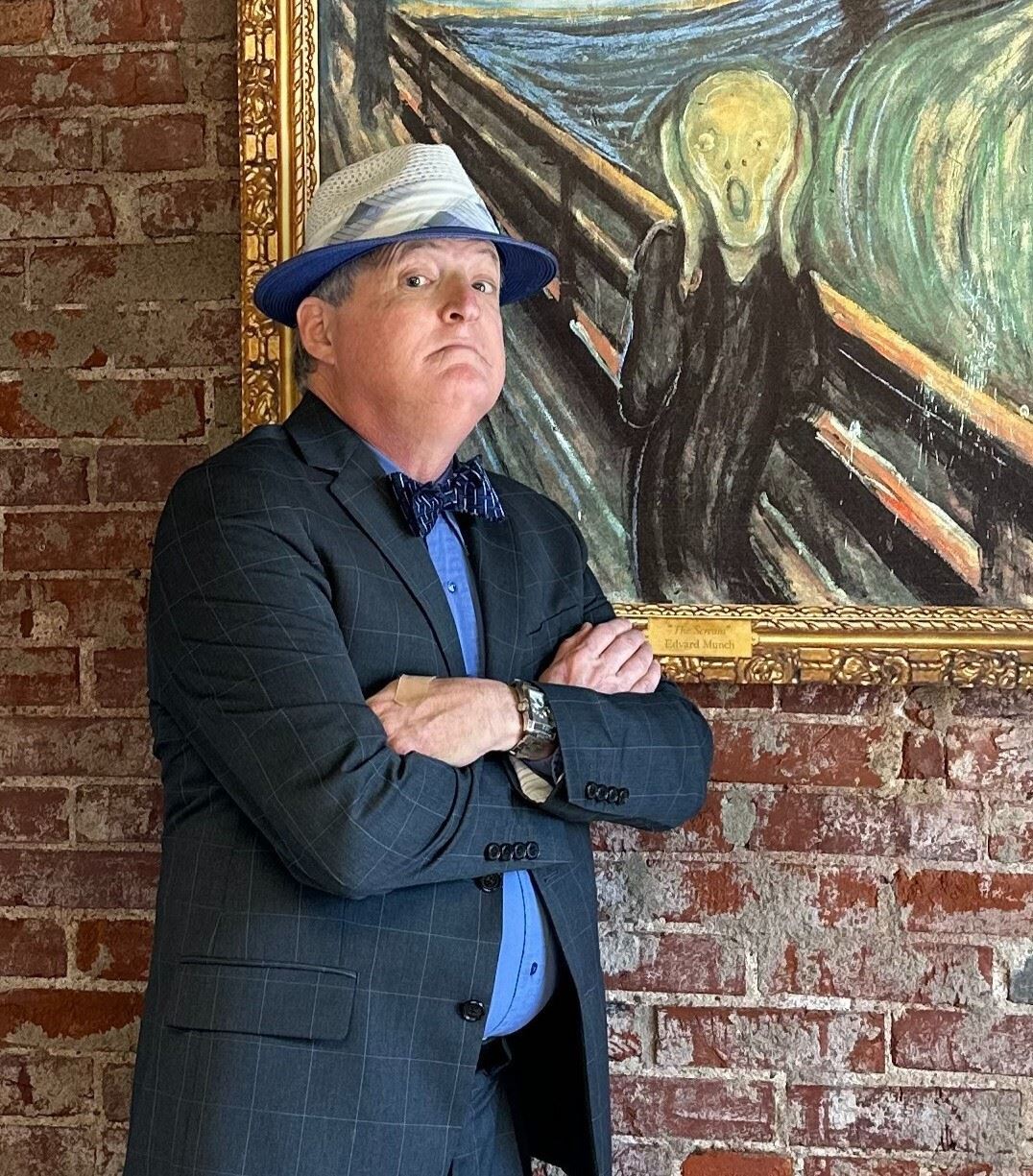 Al Canal in the Wildey Theatre booking agent's office next to a painting